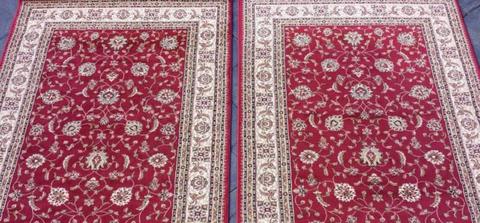 Two burgundy rugs. Price is for both! Will Separate