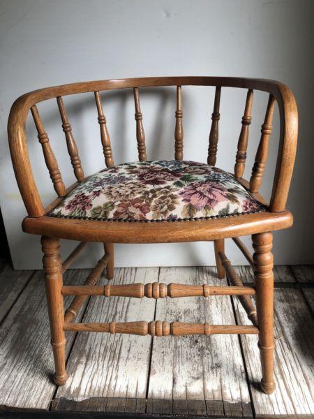 Vintage wooden chair with embroidered seat