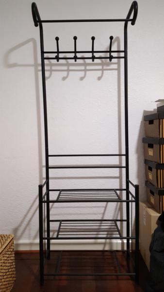 Black hanging clothes rack
