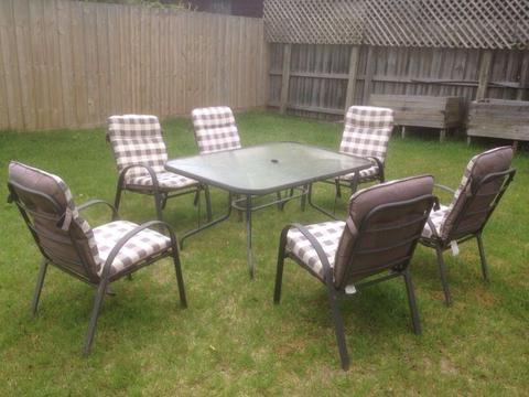 7 piece outdoor setting including comfy cushions