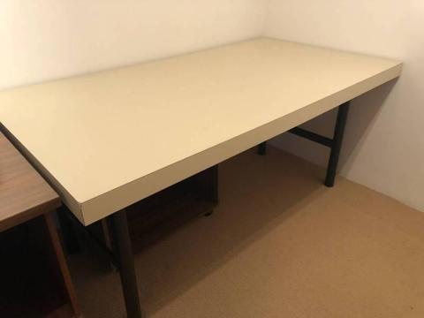Cream table with steel legs