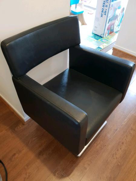 Black leather hair dressing chair