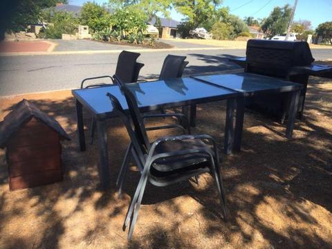 Free 6 outdoor chairs (worn), bbq needs new plates, dog house