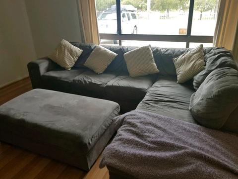 Large L shape couch in grey