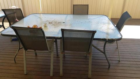 Large outdoor table and 5 chairs