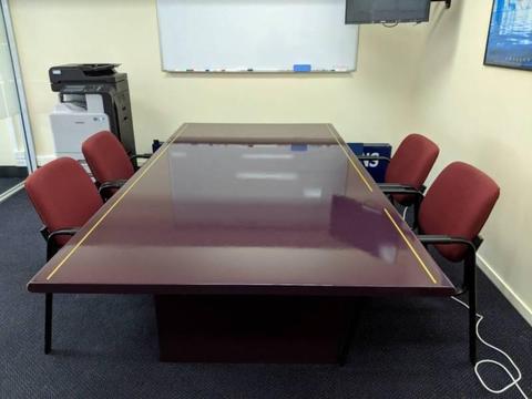 Large solid boardroom table