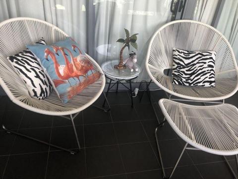 Set of two large Acapulco outdoor chairs, foot stool and table
