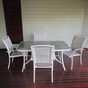 Glass outdoor table with chairs