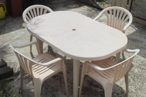 garden table and stackable chairs, cream