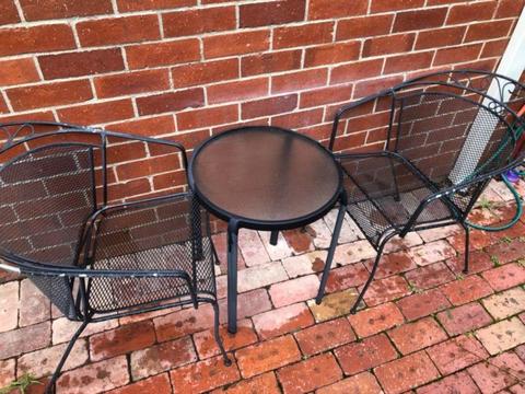 Outdoor chairs and small table in good condition