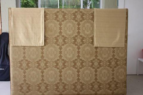 Gold bed head with matching pillow cases and padded valance