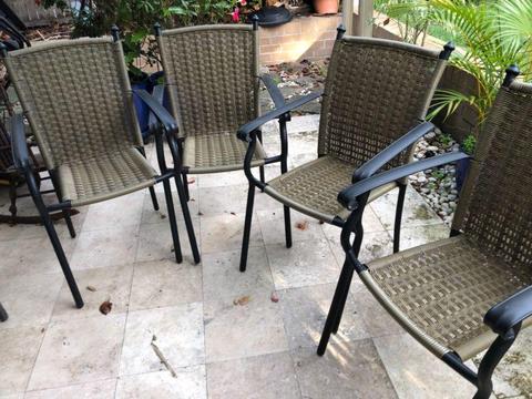 4 outdoor patio chairs with chair pads. 4 for $50