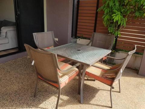 Outdoor setting with cushions in excellent condition