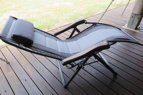 Two reclining folding deckchairs: lounge, beach,camping, fishing