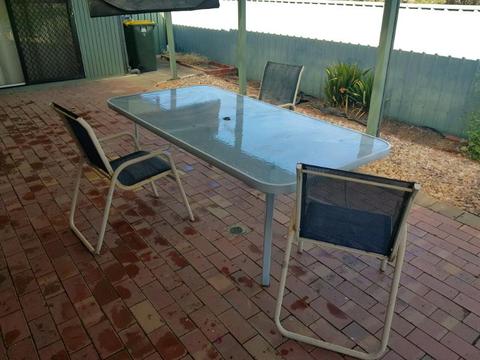 Outdoor glass table and 3 chairs
