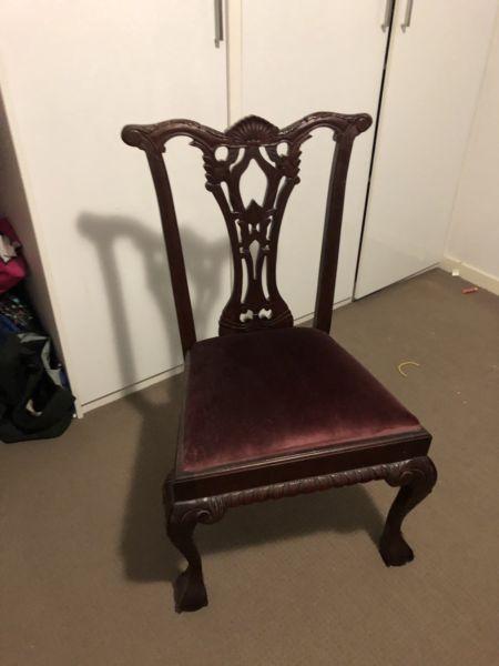 Antique-looking chair with velvet cushion
