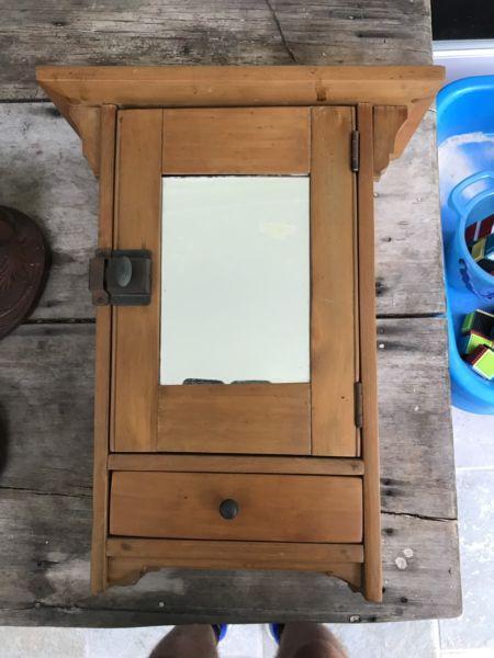 Mirrored wall cabinet with drawer
