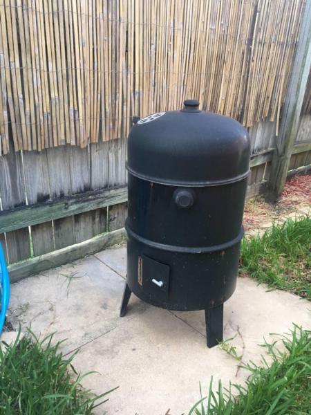 Portable charcoal smoker and grill