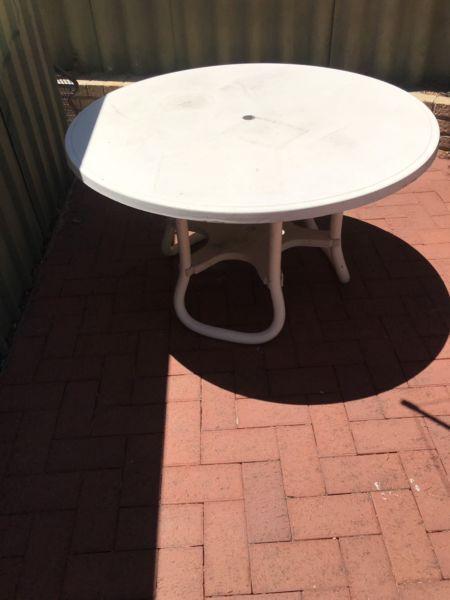 White outdoor round table