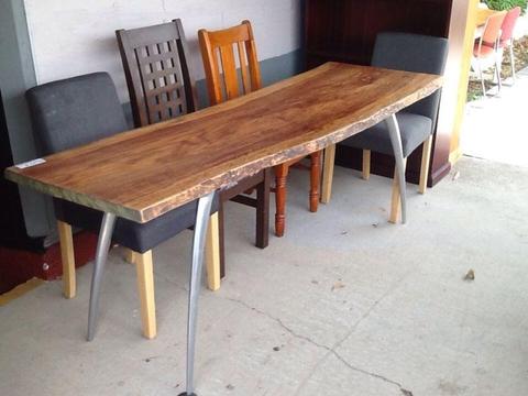 Slab tables with modern steel bases in Clontarf