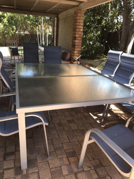Huge glass outdoor table and chairs