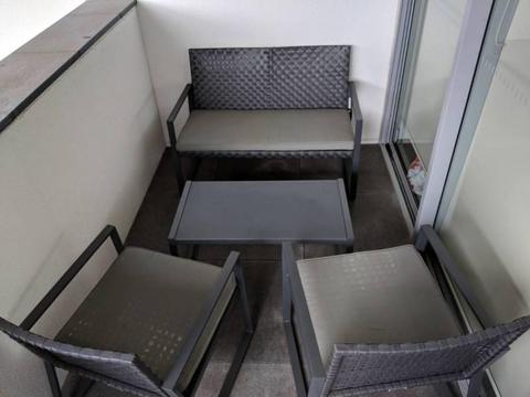 Four seat grey outdoor furniture set
