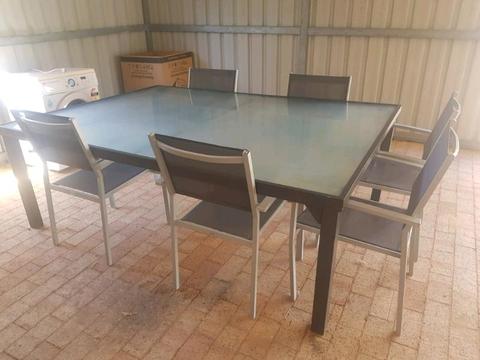 10 seater outdoor table with eight chairs