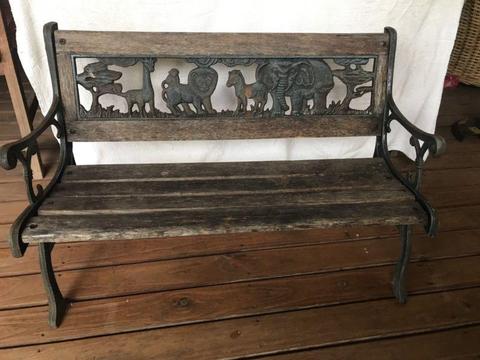 Child's wrought iron and timber garden bench