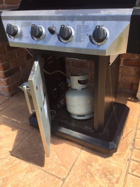Bbq with cover and gas bottle