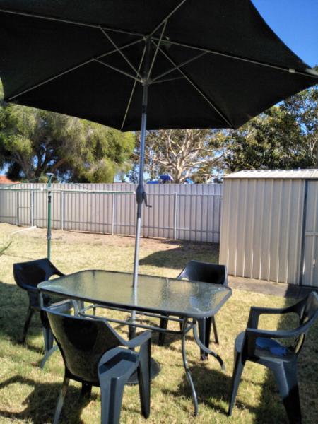 Outdoor table and chairs (x4) with umbrella and stand