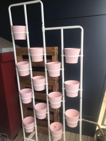 Plant stand indoor outdoor with pink pots herb holder