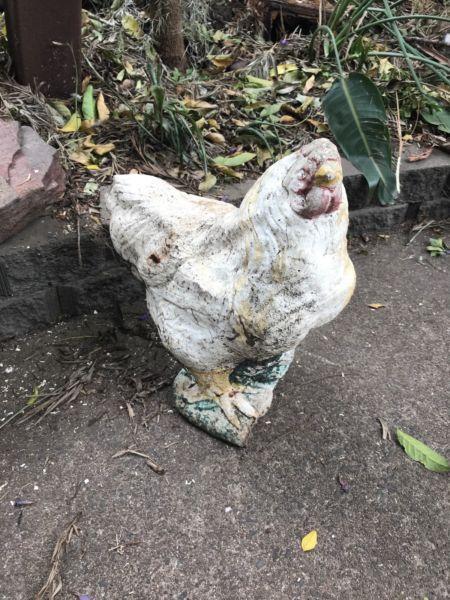 Old vintage rooster garden statue
