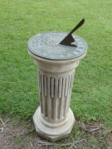 Sundial on concrete plinth. Garden Ornament