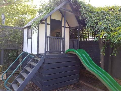 Cubby house with slide and storage