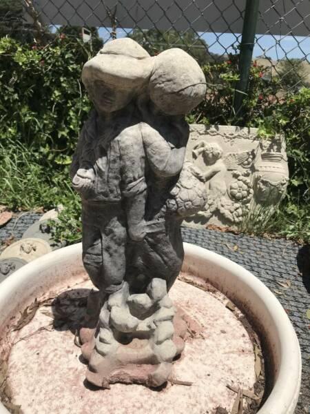 boy and girl statue water feature
