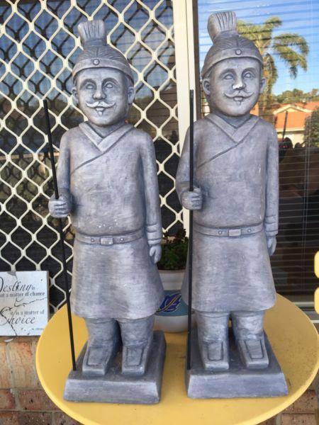 Pair of warrior garden statues