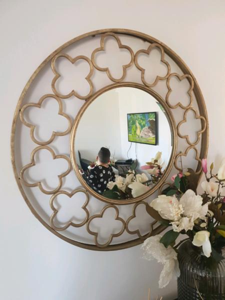 Large round gold mirror