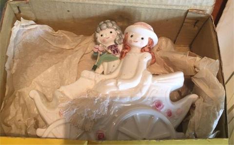 Porcelain Boy & Girl in Carriage Money Box - New