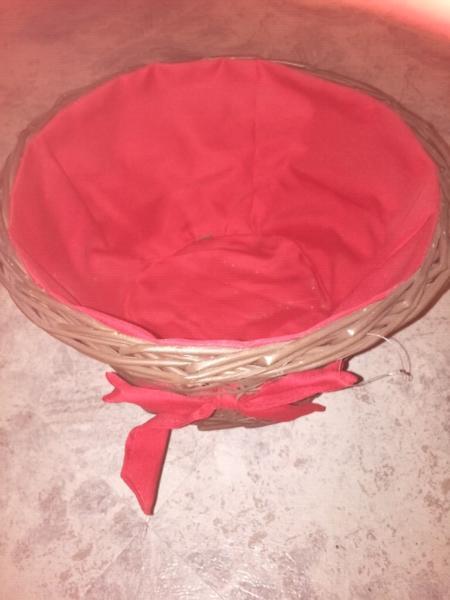 Lined cane basket 20cm high x 36cm diameter at the top