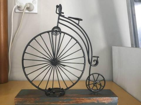 Home decor vintage steel bike on timber base sculpture