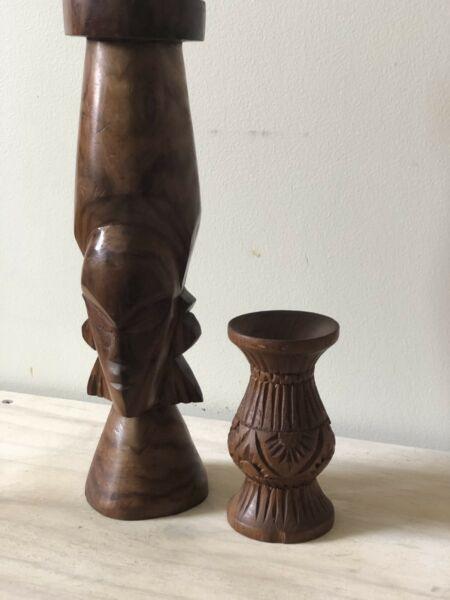 2 carved timber candle holders