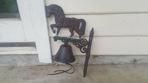 Horse door bell