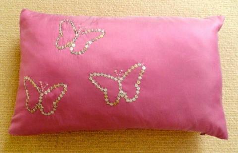 Decorative pink butterfly cushion