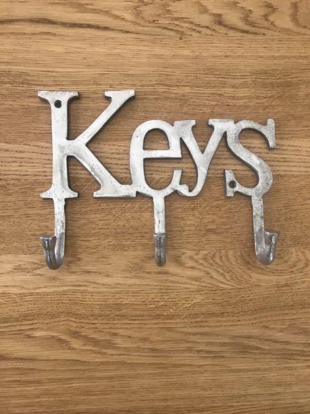 Keys sign with hooks