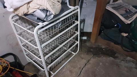 Storage basket with slide out
