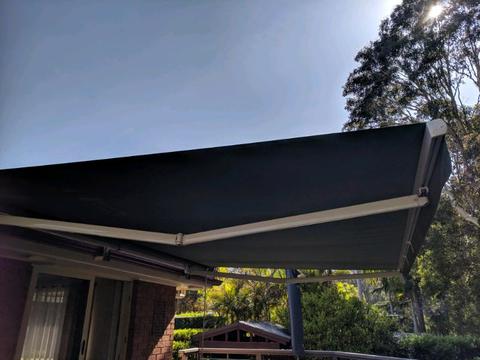 Retractable canvas awning