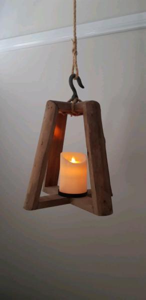 Hanging timber candle holder
