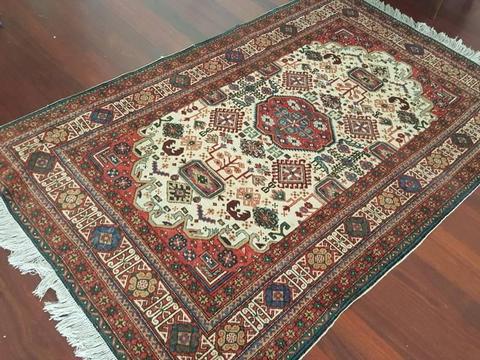 Persian rug (135 x 203 cm)