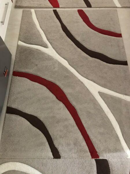 Price Dropped! Red, brown and grey style carpet excellent condition