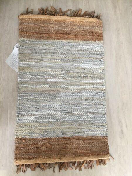 Leather & cotton hand tufted rug